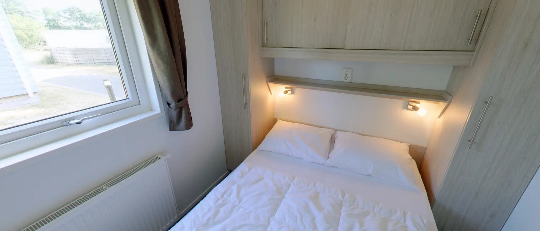 de slaapkamer van een verhuuraccommodatie in de virtuele tour